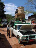 Truck piled high with luggage, Myanmar