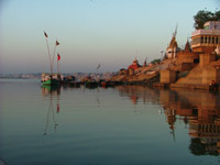 Reflections of boats and ghats in the Ganges, Varanasi