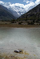 Lake or tal with mountains behind