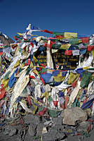 Prayer flags at the top of Thorung La
