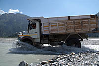 Truck crossing river en route to Ghasa